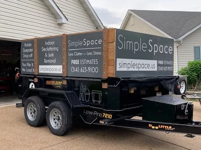 small trailer parked in front of home