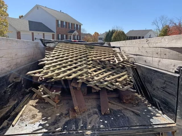 trailer with lattice fence debris